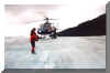 Liz leaving helicopter on Glacier.JPG (24474 bytes)